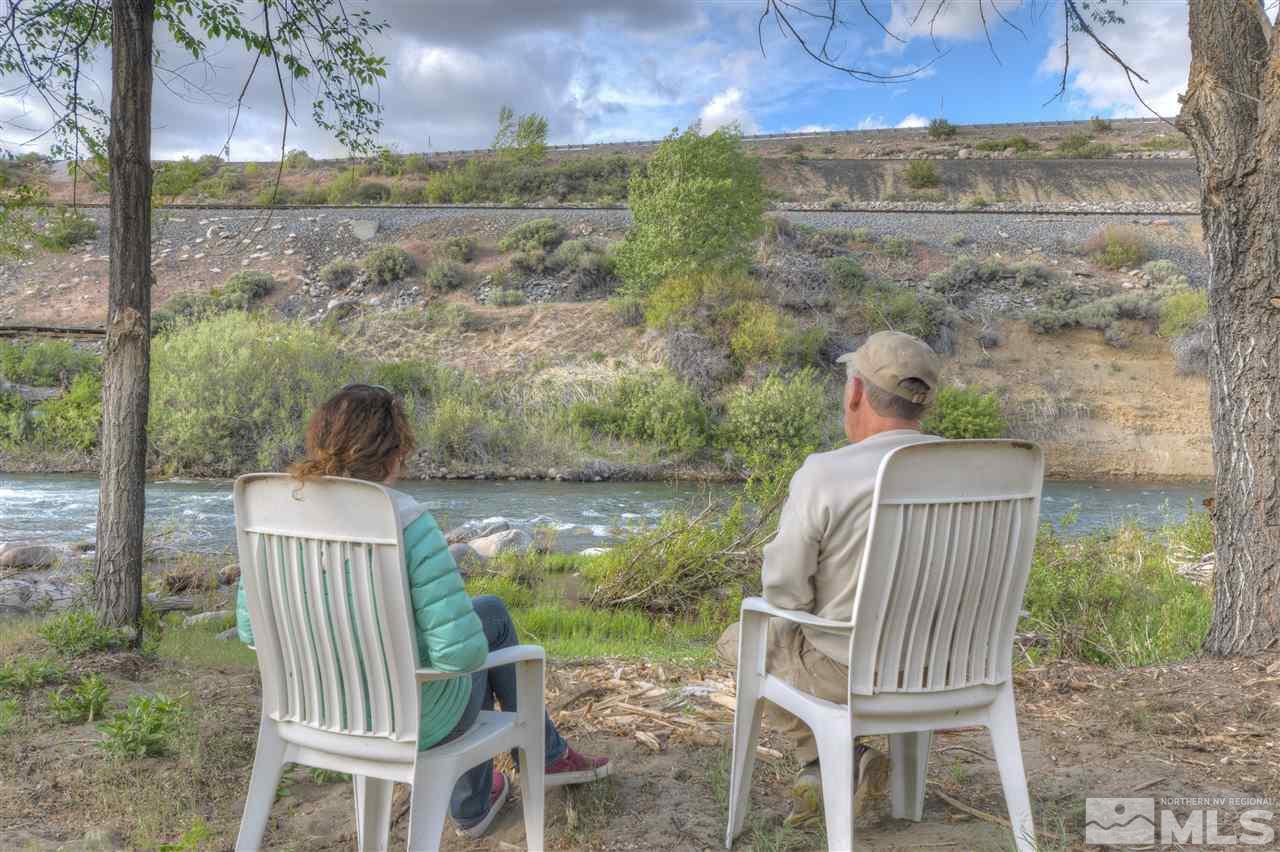 3065 Mario Road Verdi, NV 89523 - Photo 8 of 13 a view of balcony with two chairs and a wooden fence