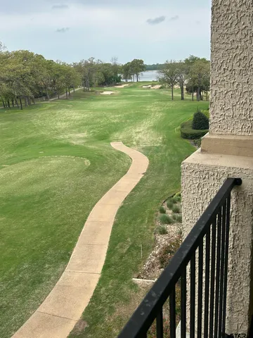 a view of a garden from a balcony