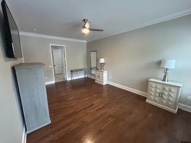 a view of room with wooden floor and chair