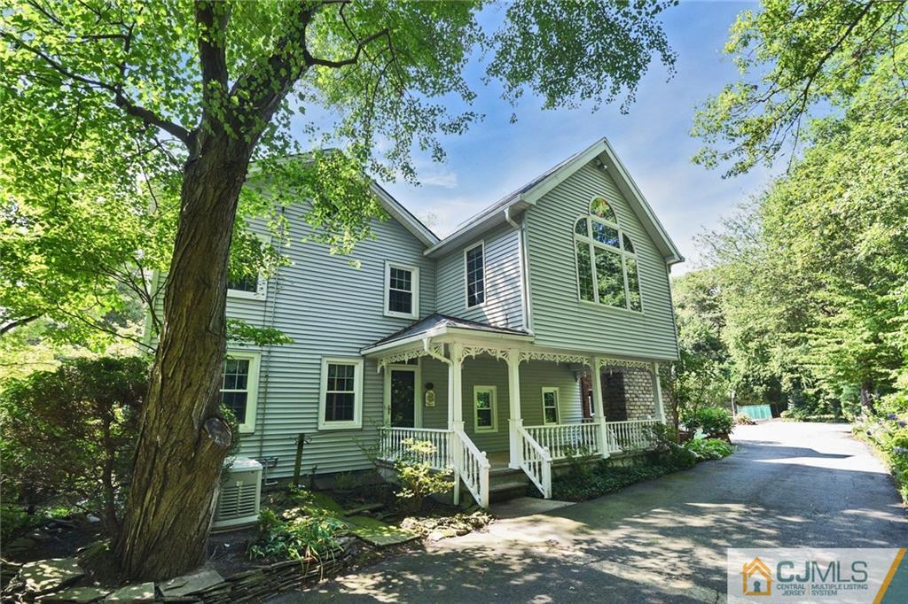 59 Spring Hill Road Old Bridge, NJ 07747 - Photo 2 of 24 a front view of a house with garden