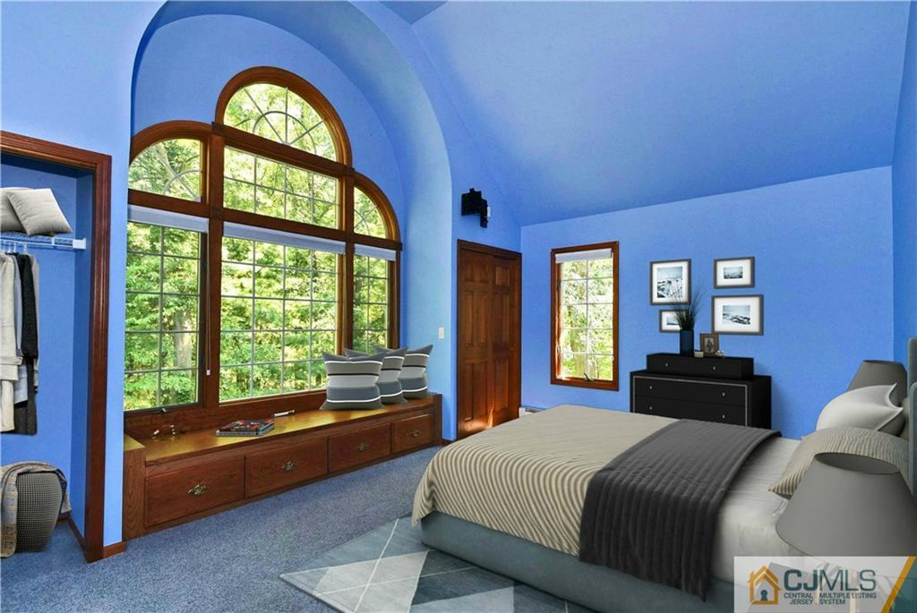 59 Spring Hill Road Old Bridge, NJ 07747 - Photo 12 of 24 a bedroom with a large bed and a large window