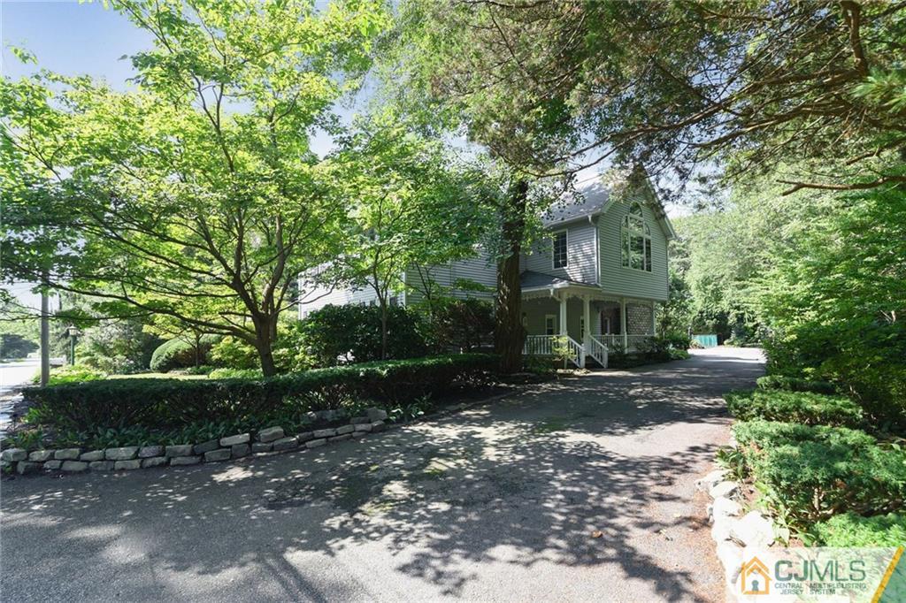 59 Spring Hill Road Old Bridge, NJ 07747 - Photo 23 of 24 a view of a house with a tree in front