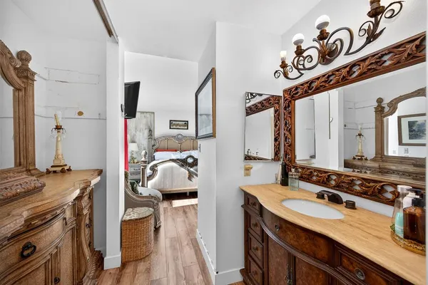 a kitchen with a stove and a sink