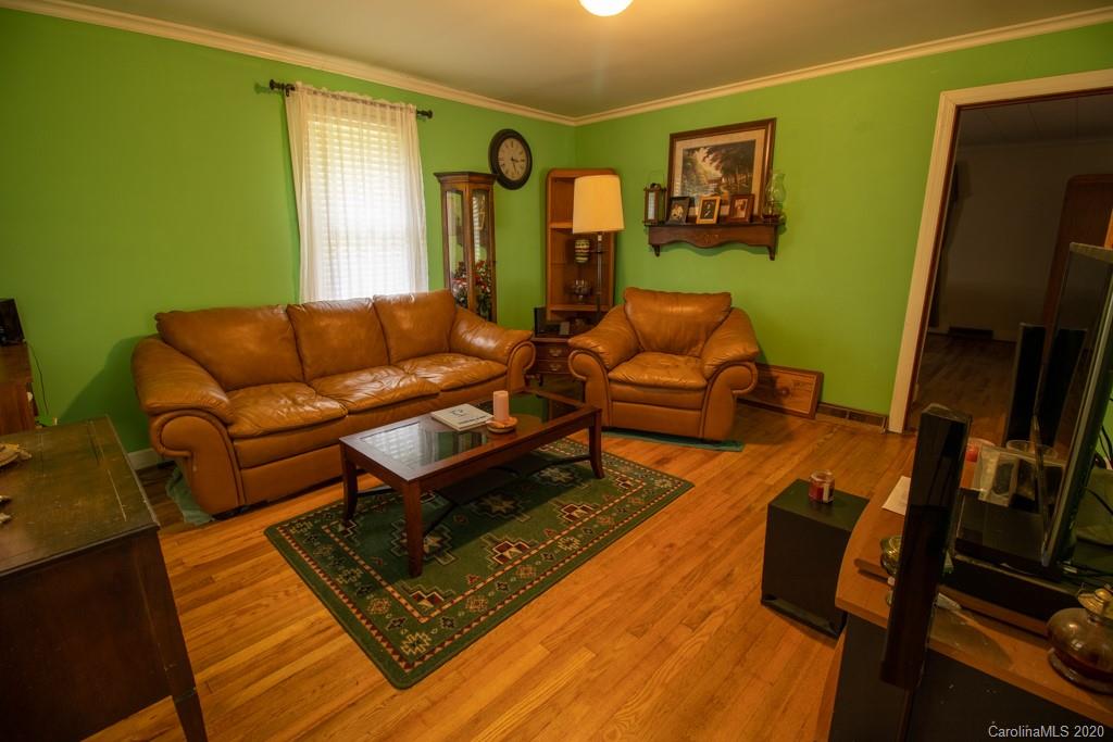 1271 Upper Brush Creek Road Fairview, NC 28730 - Photo 13 of 19 a living room with furniture rug and window