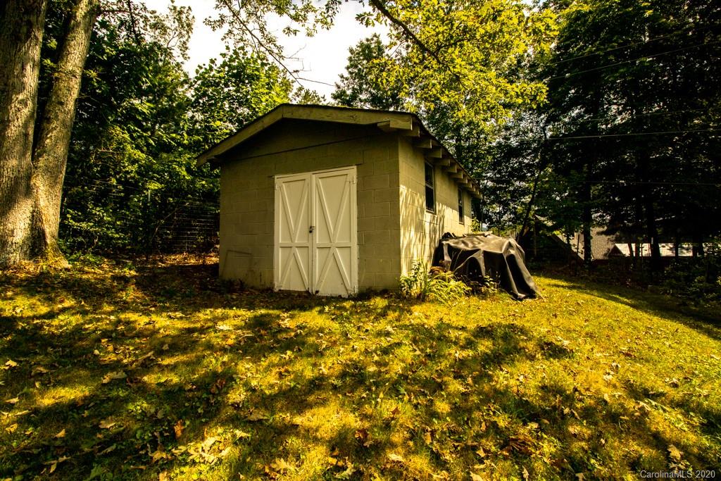 1271 Upper Brush Creek Road Fairview, NC 28730 - Photo 18 of 19 a house with a yard