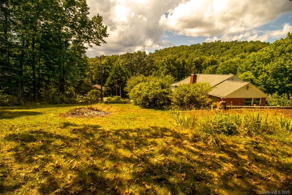 1271 Upper Brush Creek Road Fairview, NC 28730 - Photo 19 of 19 a view of yard with swimming pool and green space