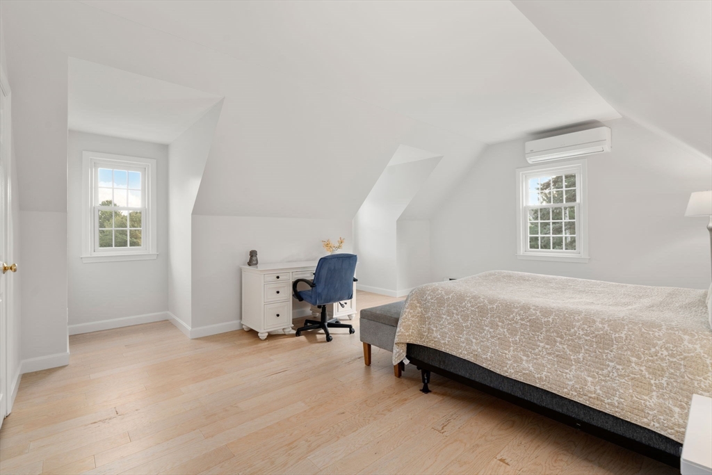 216 Old Littleton Road Harvard, MA 01451 - Photo 21 of 34 a bedroom with a bed chair and window