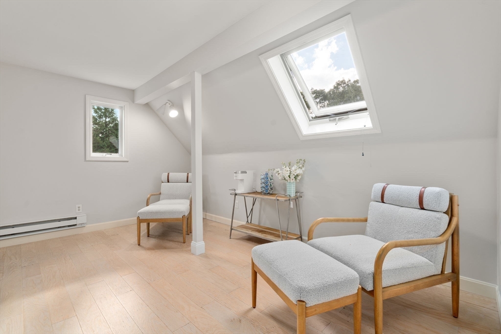 216 Old Littleton Road Harvard, MA 01451 - Photo 23 of 34 a room with furniture and a window