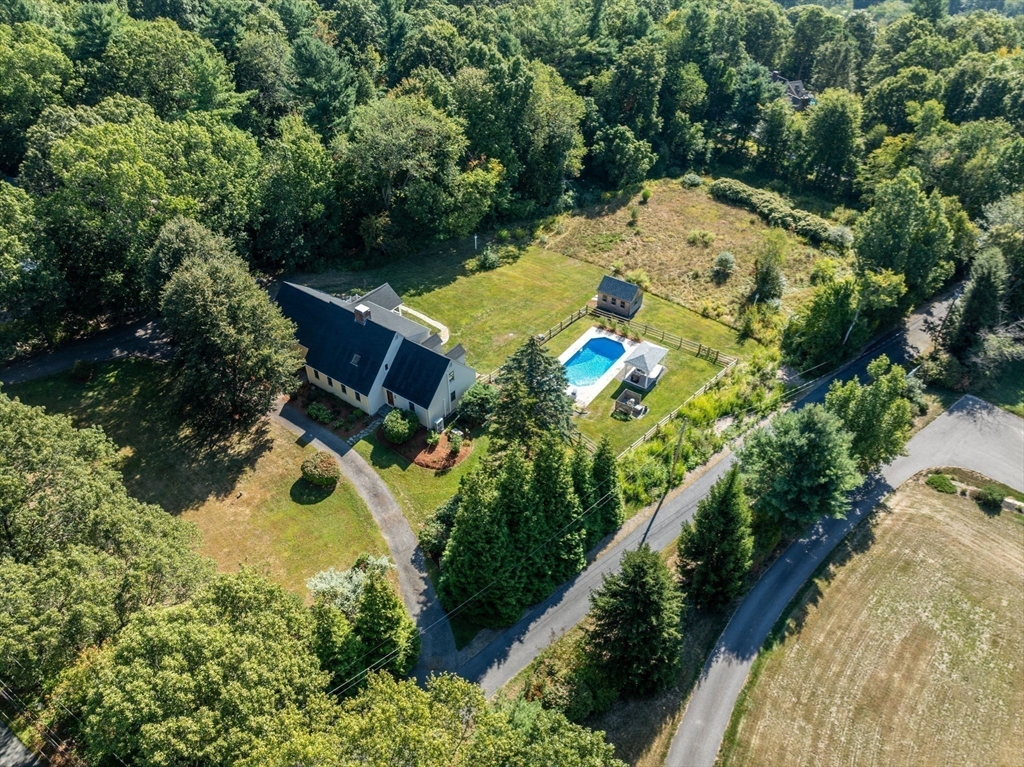 216 Old Littleton Road Harvard, MA 01451 - Photo 34 of 34 an aerial view of a house with a yard