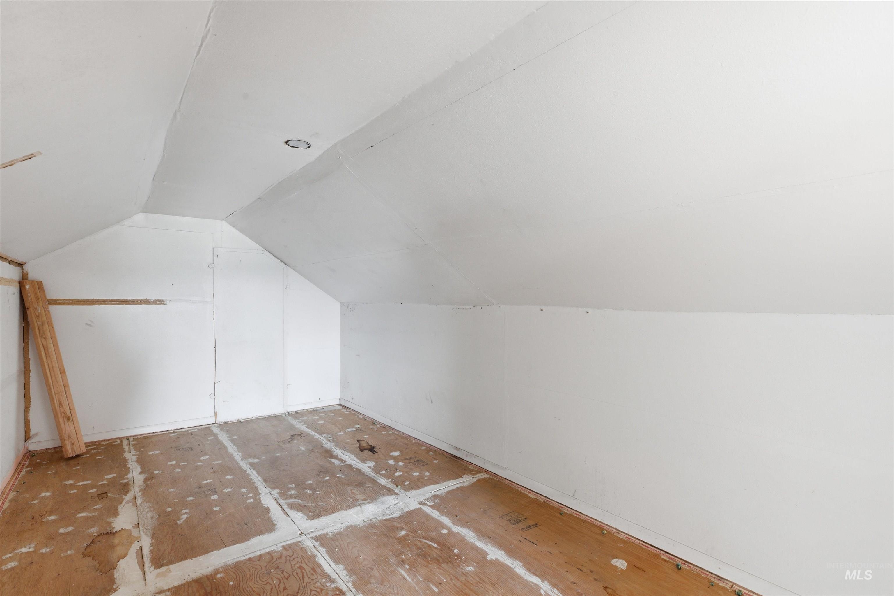 810 Pine Street Potlatch, ID 83855 - Photo 20 of 33 Attic space with sloped ceilings, recessed lighting, and exposed subflooring