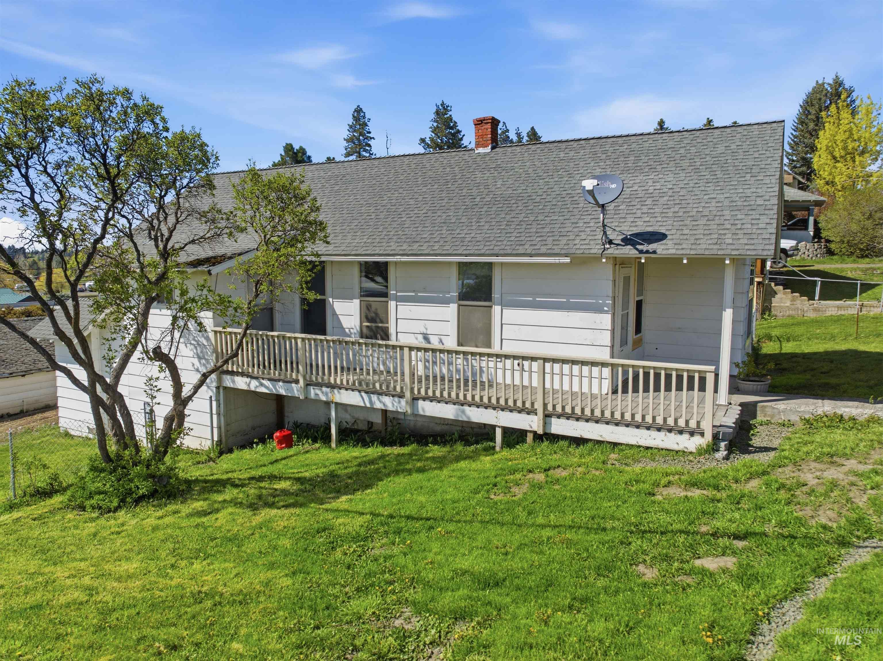810 Pine Street Potlatch, ID 83855 - Photo 25 of 33 White siding residence featuring a spacious wood deck with ramp access