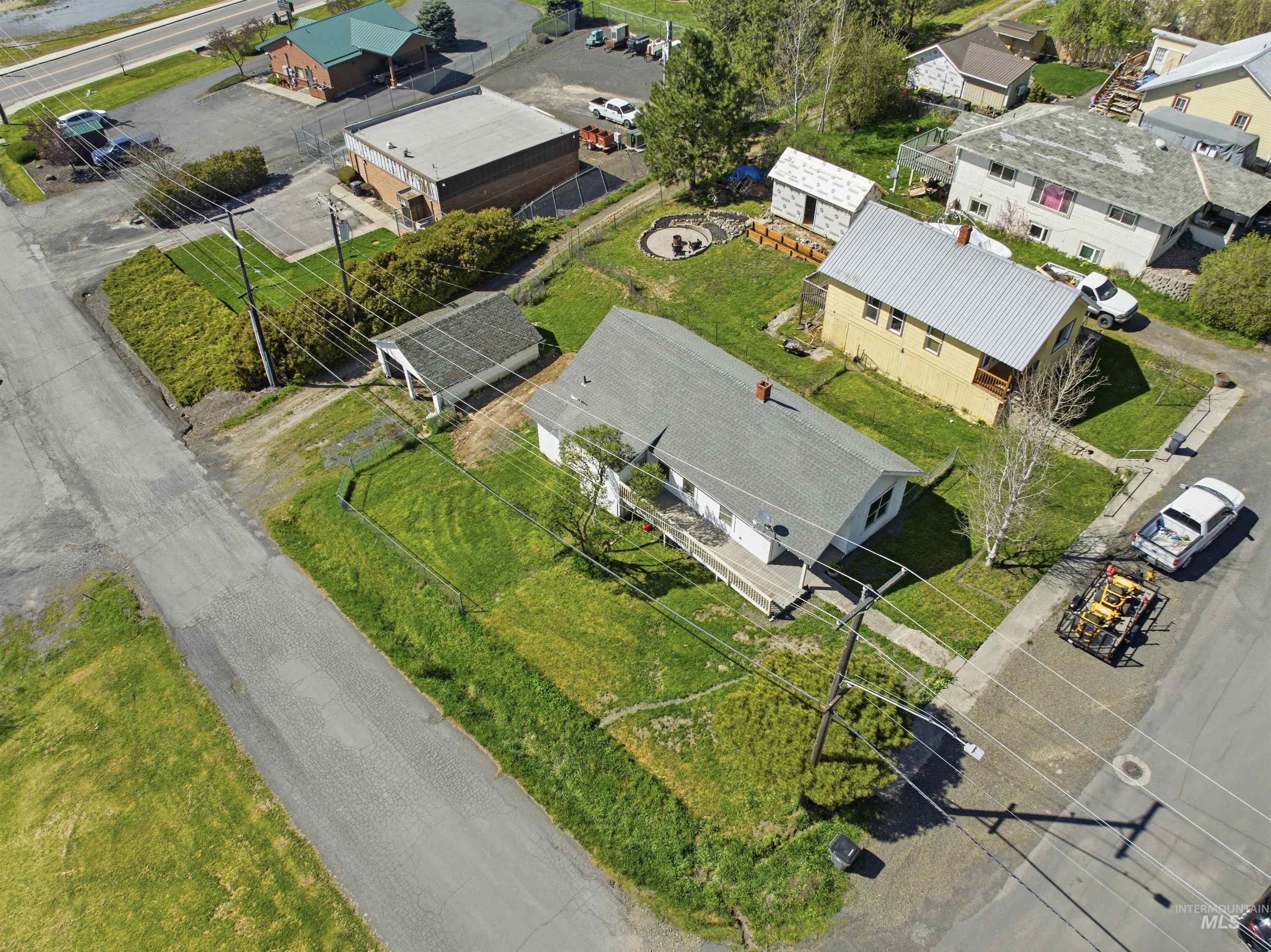 810 Pine Street Potlatch, ID 83855 - Photo 30 of 33 Aerial perspective showcasing multiple structures on a generously sized parcel