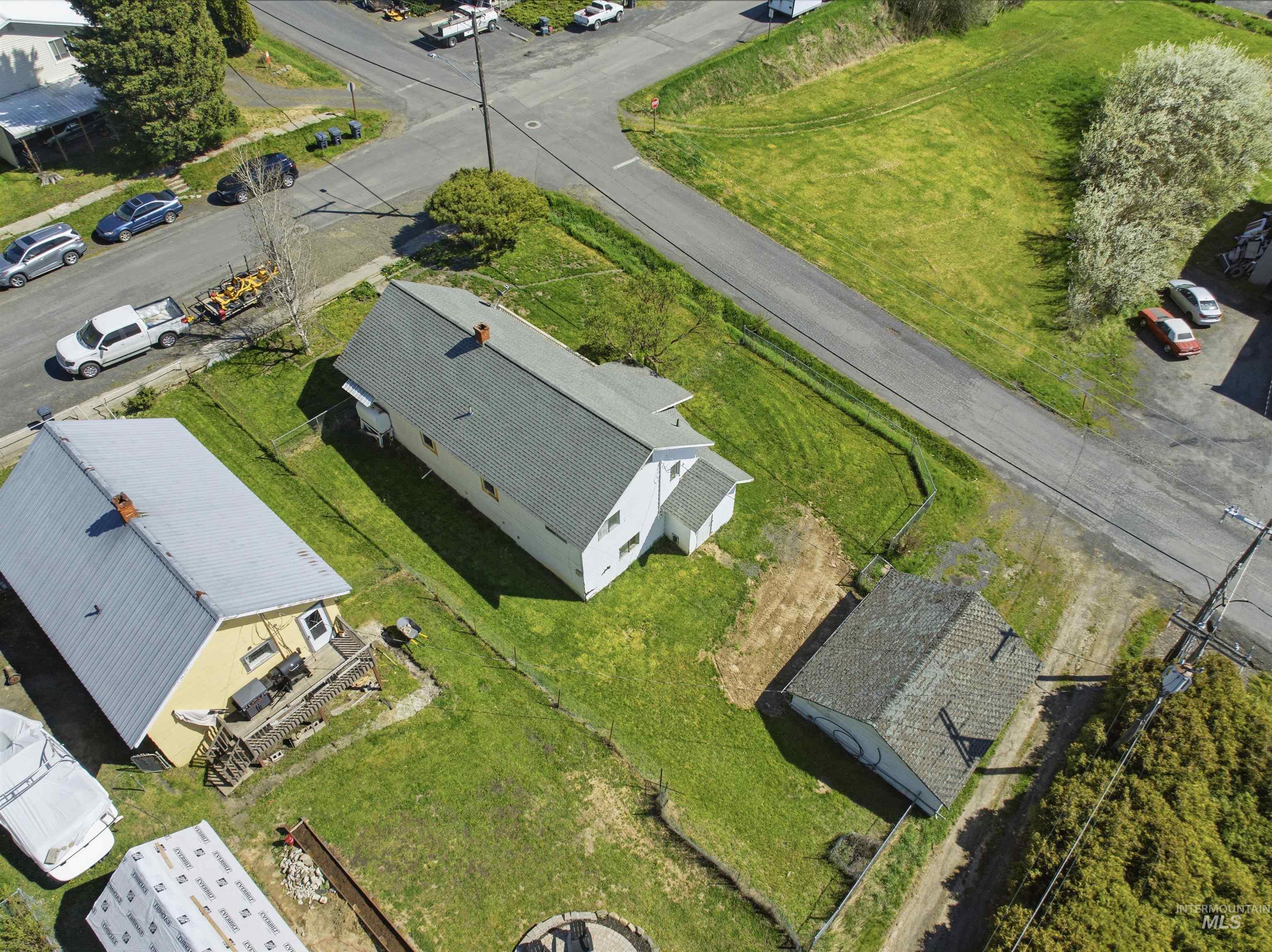 810 Pine Street Potlatch, ID 83855 - Photo 32 of 33 Two-story property featuring a light-colored exterior and a dark-toned gable roof
