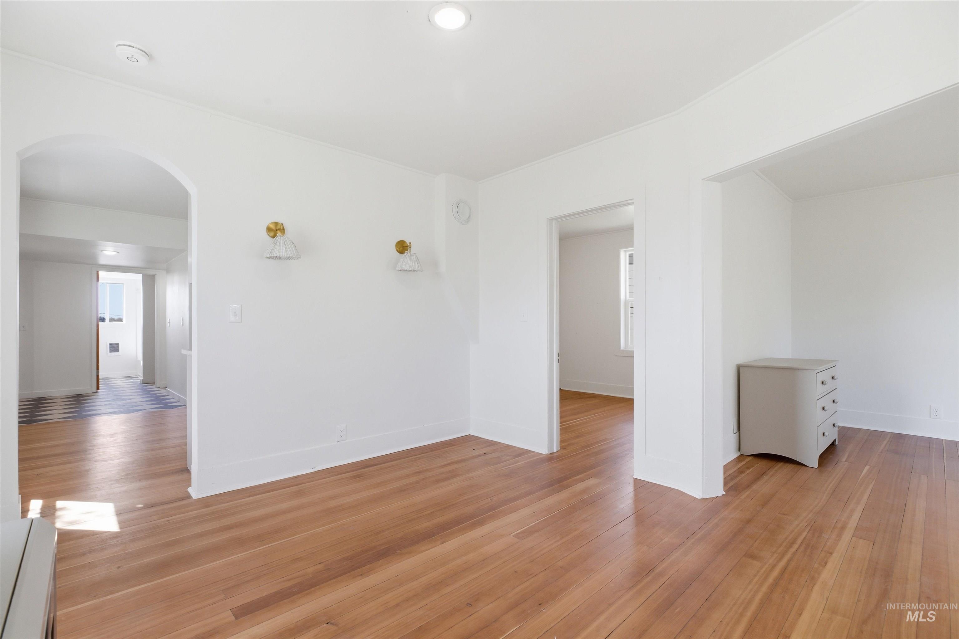 810 Pine Street Potlatch, ID 83855 - Photo 4 of 33 Room featuring wood-finish flooring, recessed lighting, and white walls