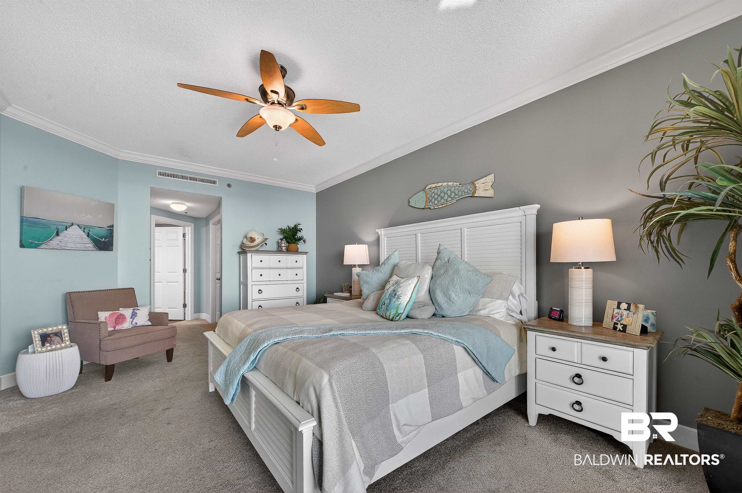 27582 Canal Road, Unit 2507 Orange Beach, AL 36561 - Photo 31 of 75 Bedroom with crown molding, carpet flooring, a ceiling fan, and a textured ceiling