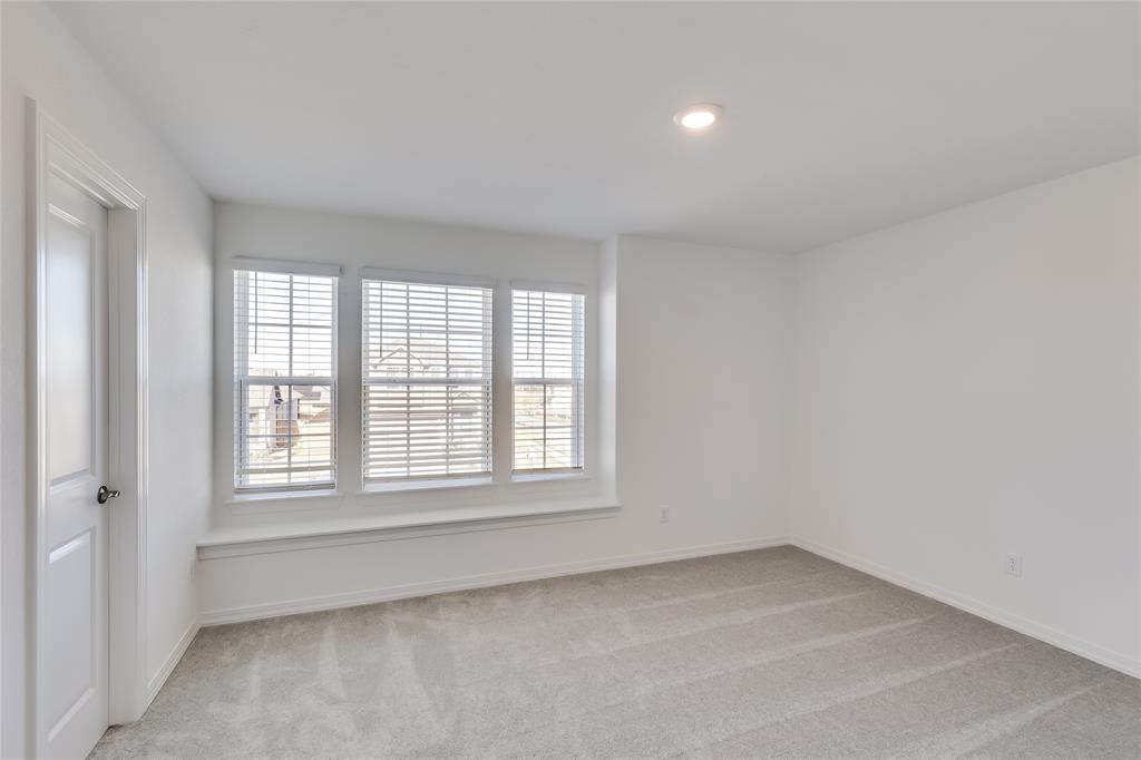 109 Bridge Deck Loop Kyle, TX 78640 - Photo 26 of 40 Spare room featuring light colored carpet and recessed lighting