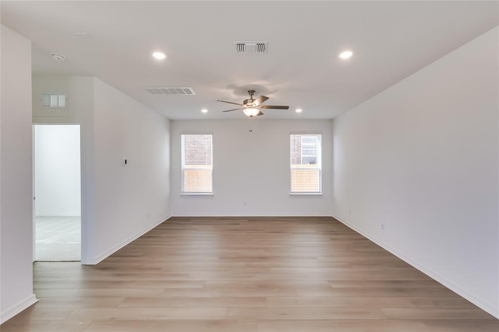 109 Bridge Deck Loop Kyle, TX 78640 - Photo 6 of 40 Unfurnished room featuring light wood-type flooring, recessed lighting, and ceiling fan