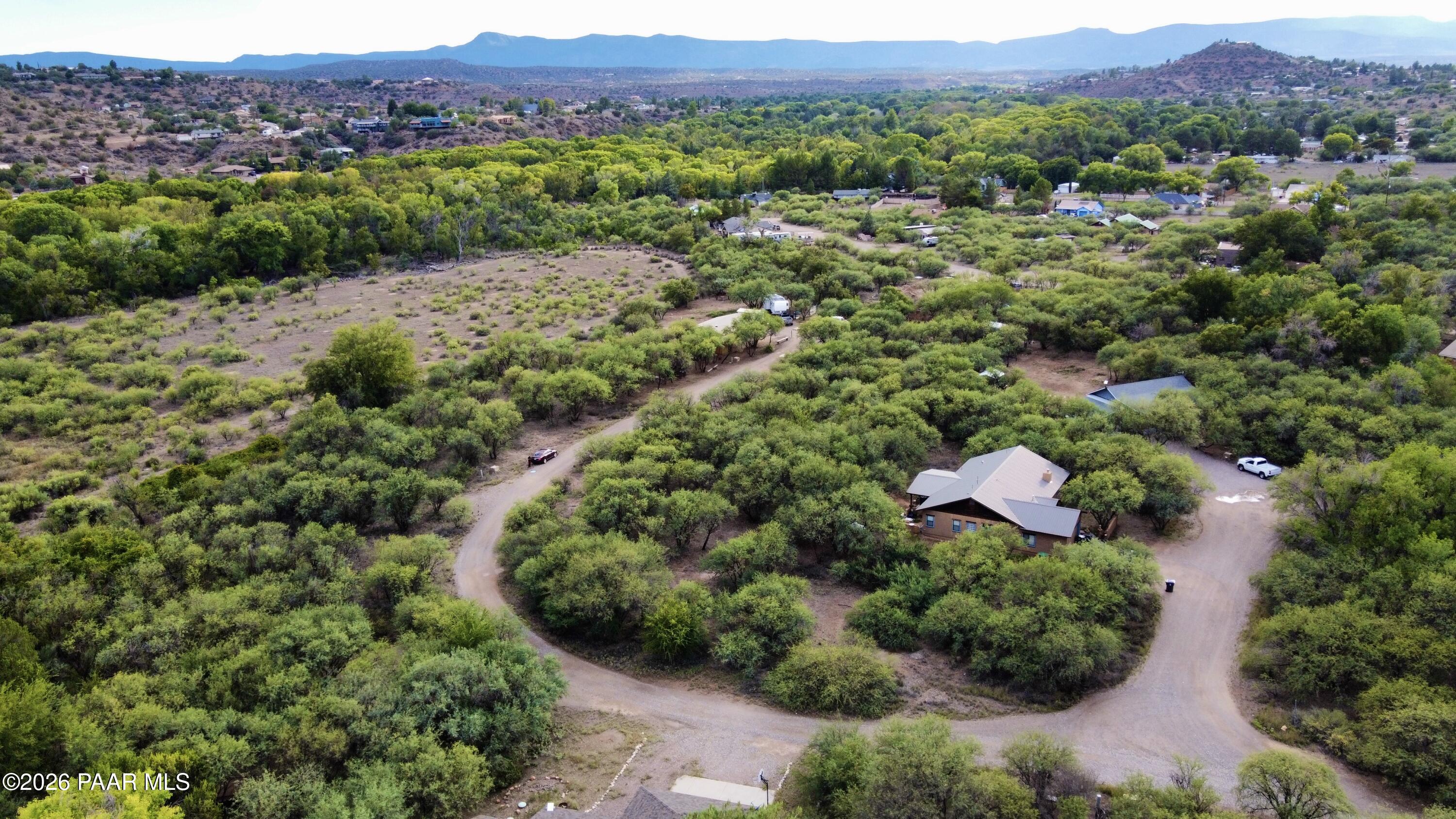 4755 East Lynn Court Lake Montezuma, AZ 86335 - Photo 2 of 36 an aerial view of a house with mountain view
