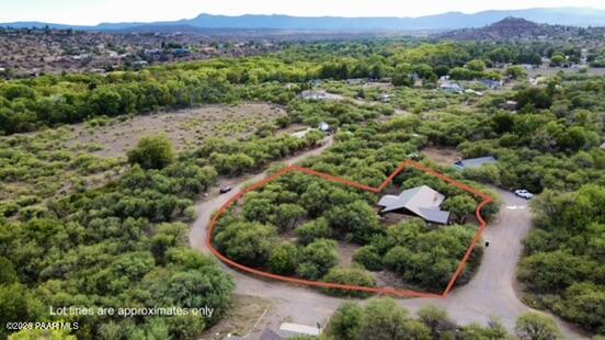 4755 East Lynn Court Lake Montezuma, AZ 86335 - Photo 3 of 36 an aerial view of a house with mountain view