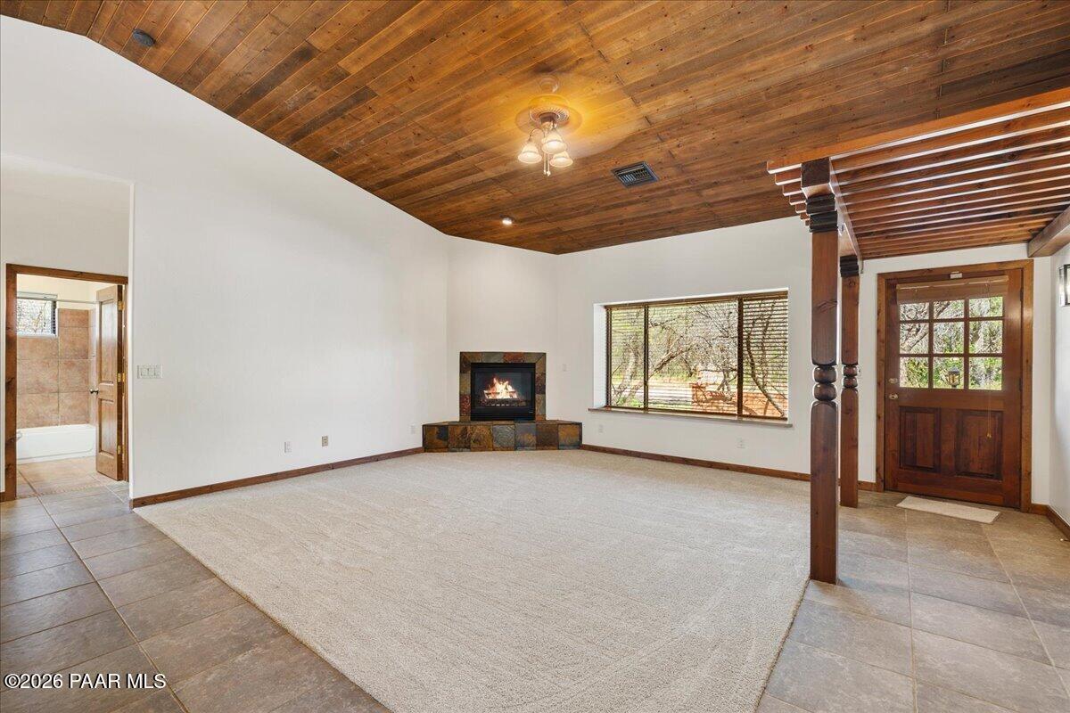 4755 East Lynn Court Lake Montezuma, AZ 86335 - Photo 4 of 36 a view of a livingroom with an empty space and a fireplace