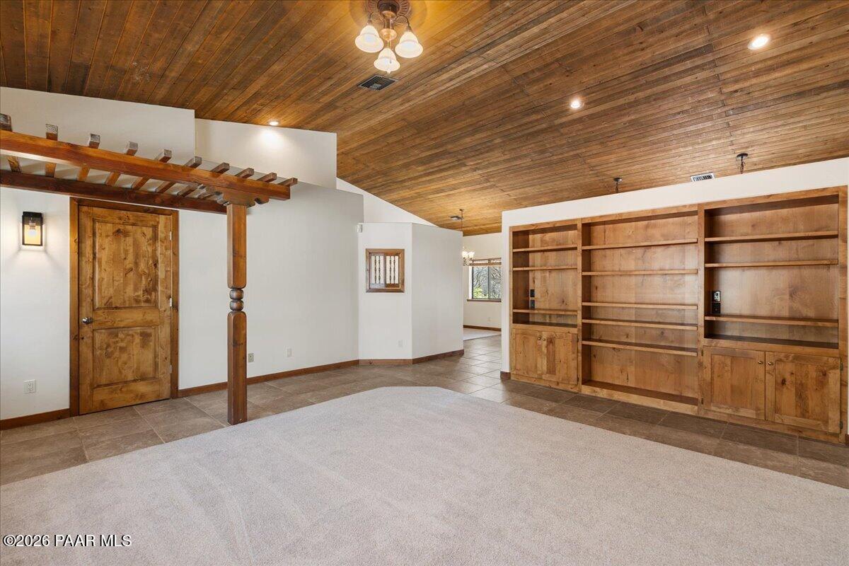4755 East Lynn Court Lake Montezuma, AZ 86335 - Photo 6 of 36 a view of an empty room with a fireplace