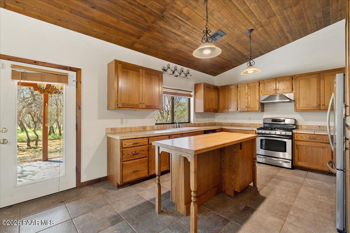 4755 East Lynn Court Lake Montezuma, AZ 86335 - Photo 8 of 36 a kitchen with a stove sink and microwave