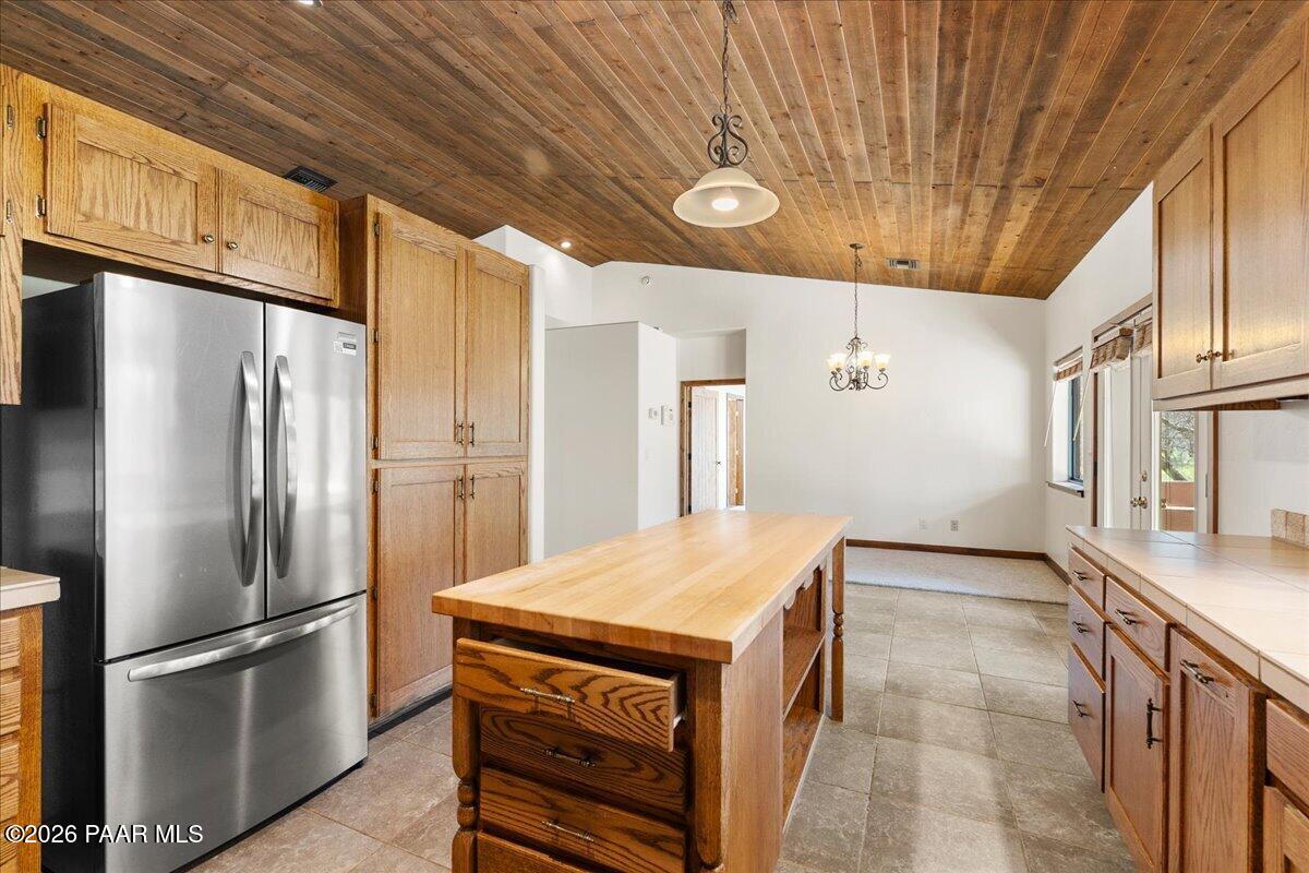 4755 East Lynn Court Lake Montezuma, AZ 86335 - Photo 10 of 36 a kitchen with stainless steel appliances granite countertop a refrigerator a sink and a stove