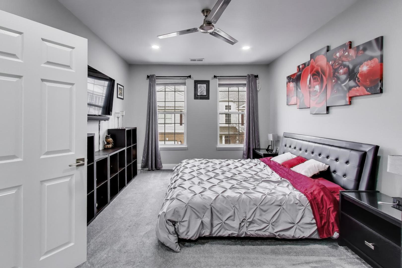 8225 Concord Lane, Unit I Justice, IL 60458 - Photo 13 of 28 a bedroom with a bed and a window