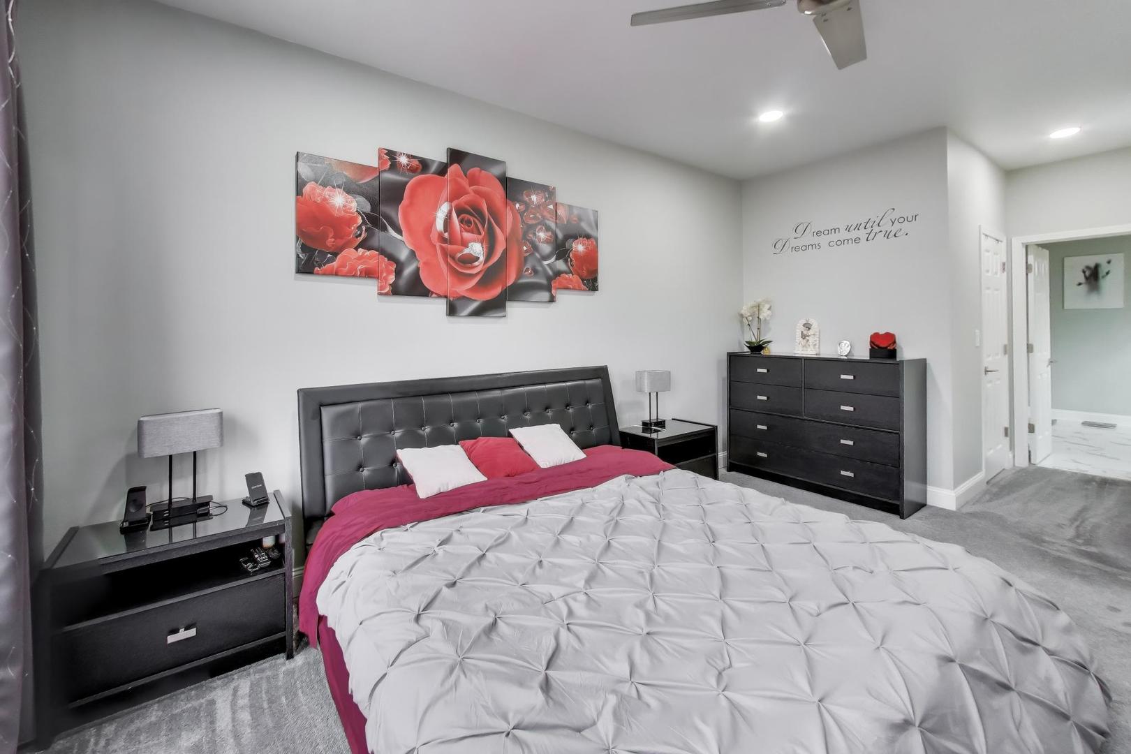 8225 Concord Lane, Unit I Justice, IL 60458 - Photo 14 of 28 a bedroom with a bed and cabinets