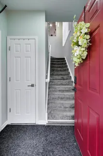 a view of entryway with wooden floor