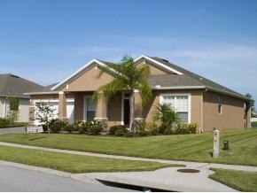 3221 Merrick Avenue Rockledge, FL 32955 - Photo 2 of 12 a front view of house with yard and green space