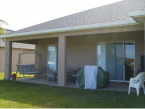 3221 Merrick Avenue Rockledge, FL 32955 - Photo 7 of 12 a view of a two chair in the patio