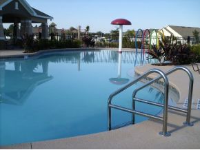 3221 Merrick Avenue Rockledge, FL 32955 - Photo 9 of 12 a view of a swimming pool with a lounge chairs