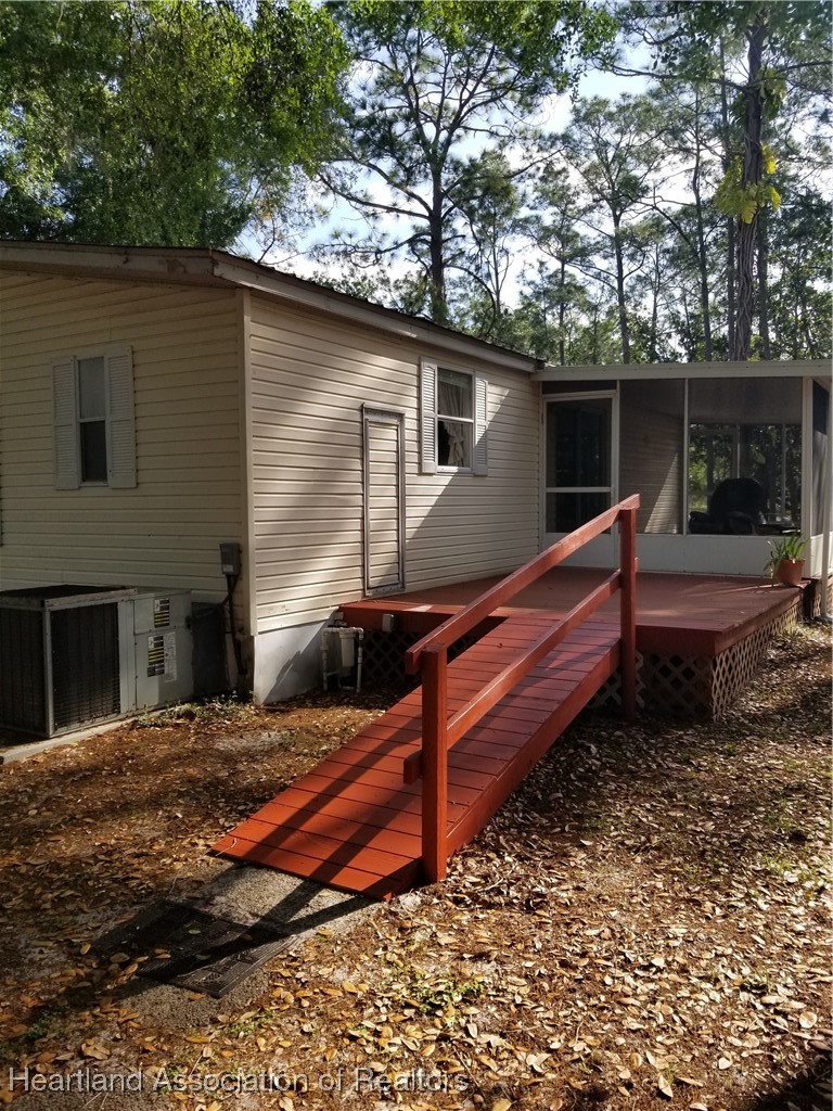 9125 Spur Path Sebring, FL 33875 - Photo 20 of 31 Desirable ramp at back of house.