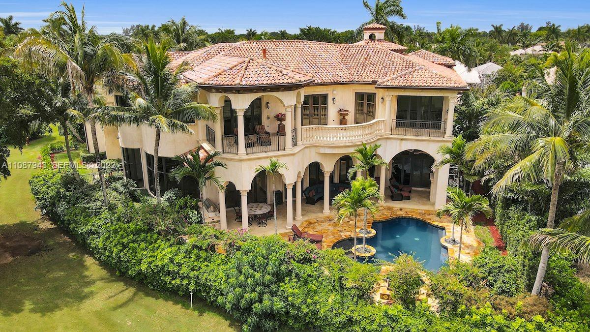 17828 Scarsdale Way Boca Raton, FL 33496 - Photo 2 of 100 a view of a house with swimming pool next to a yard