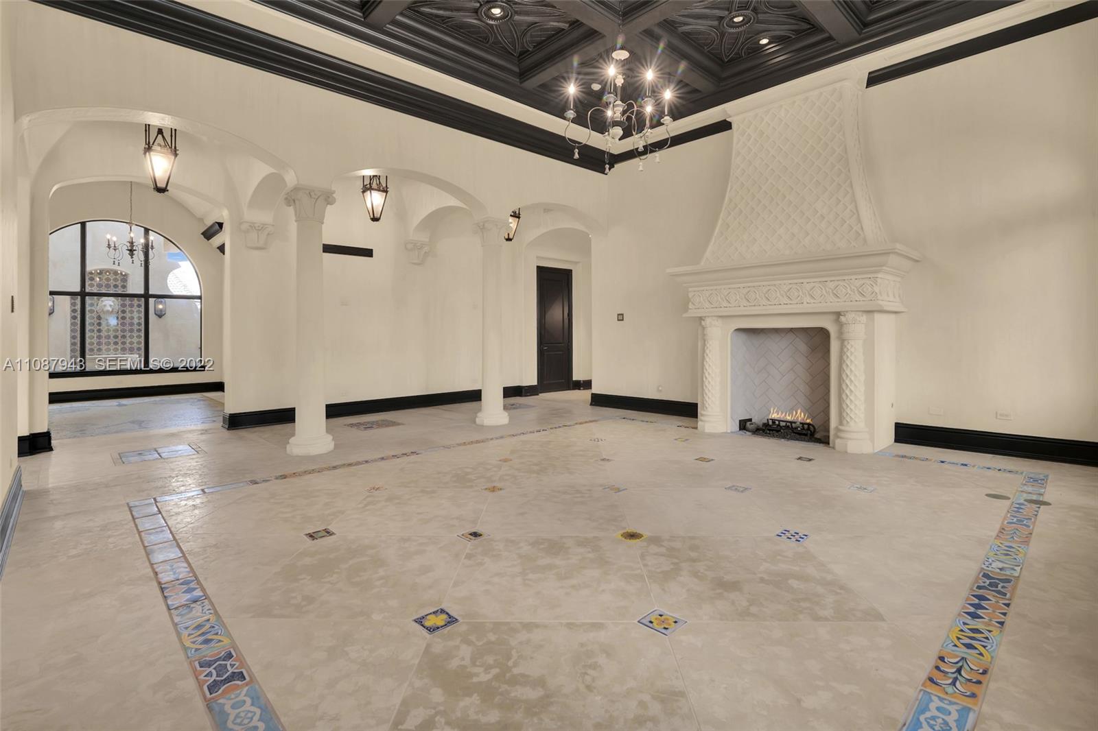 17828 Scarsdale Way Boca Raton, FL 33496 - Photo 30 of 100 a view of a livingroom with a fireplace