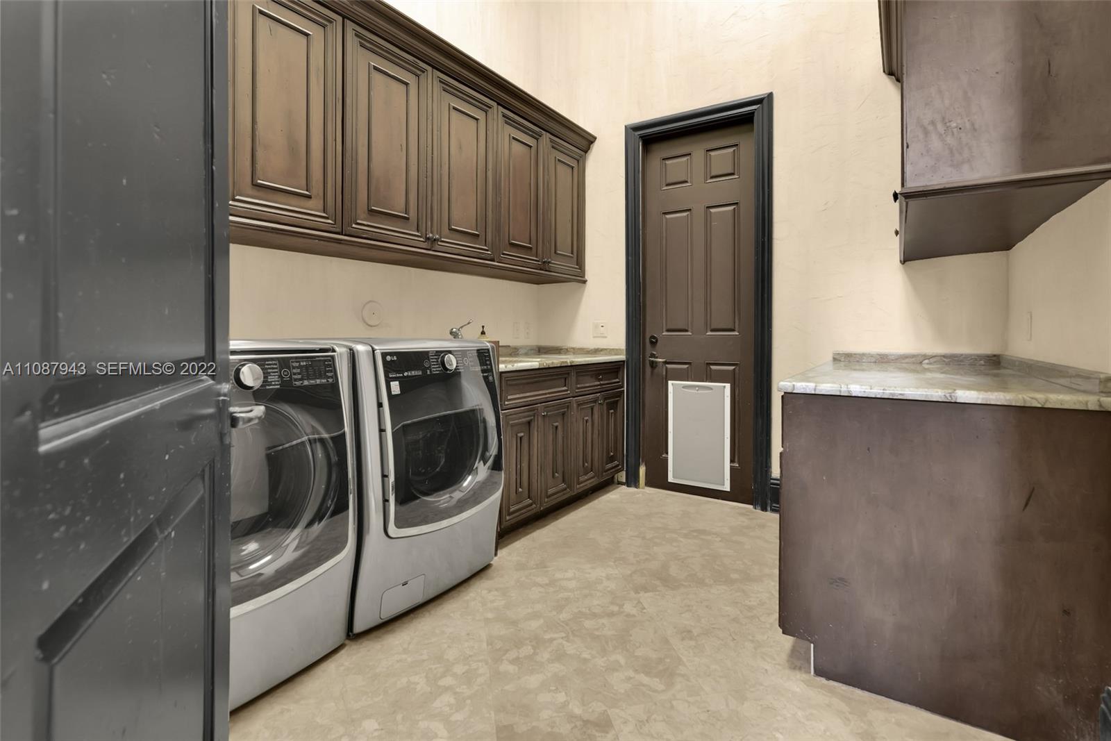 17828 Scarsdale Way Boca Raton, FL 33496 - Photo 45 of 100 a kitchen with stainless steel appliances granite countertop a refrigerator and a sink