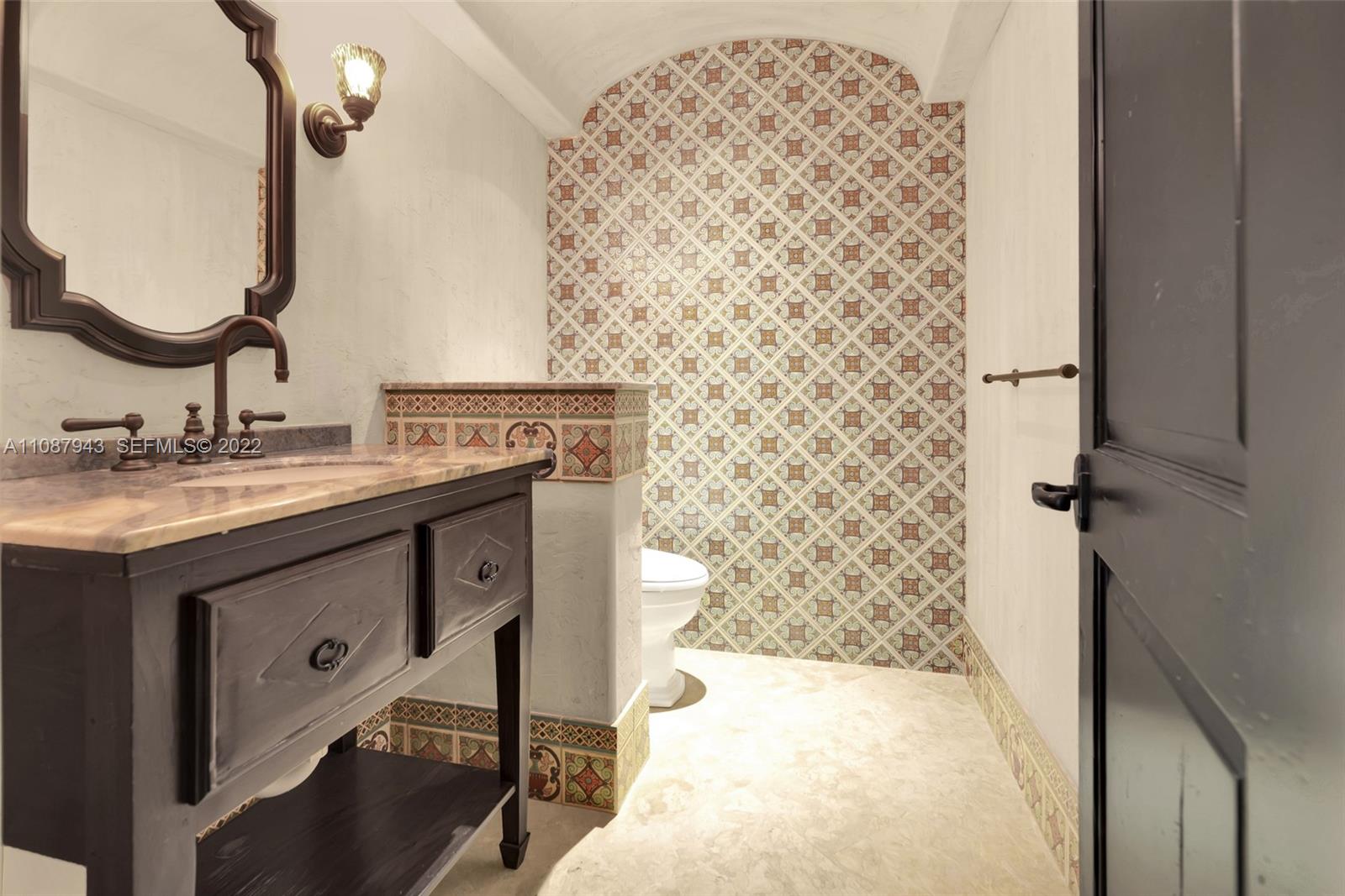 17828 Scarsdale Way Boca Raton, FL 33496 - Photo 46 of 100 a bathroom with a sink and a mirror