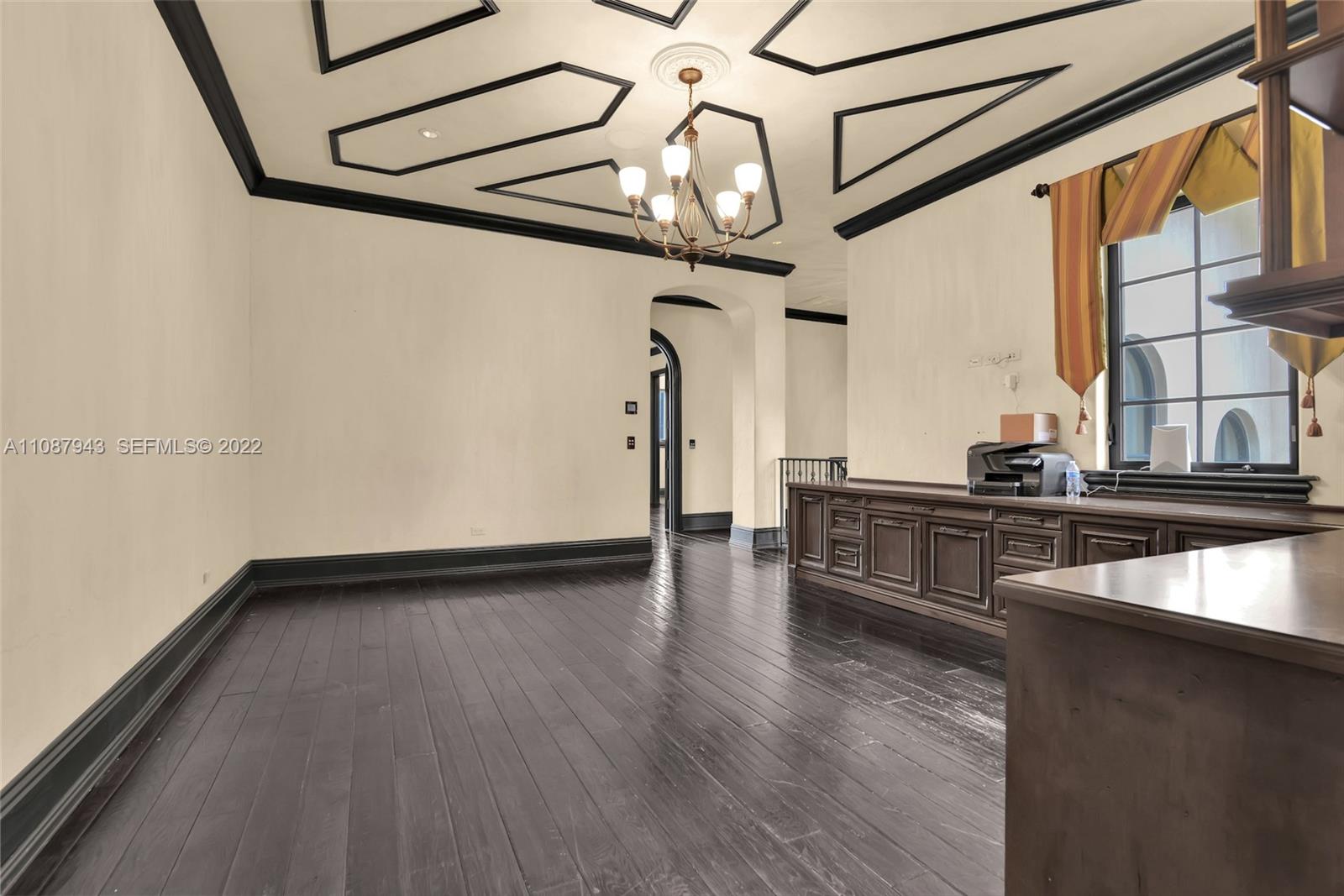 17828 Scarsdale Way Boca Raton, FL 33496 - Photo 79 of 100 a view of empty room with wooden floor and fan