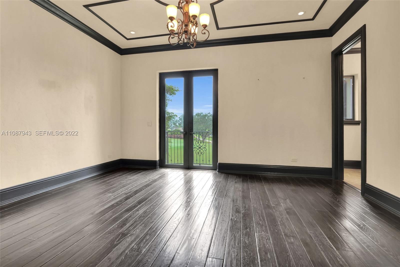 17828 Scarsdale Way Boca Raton, FL 33496 - Photo 80 of 100 a view of a livingroom with wooden floor and a window