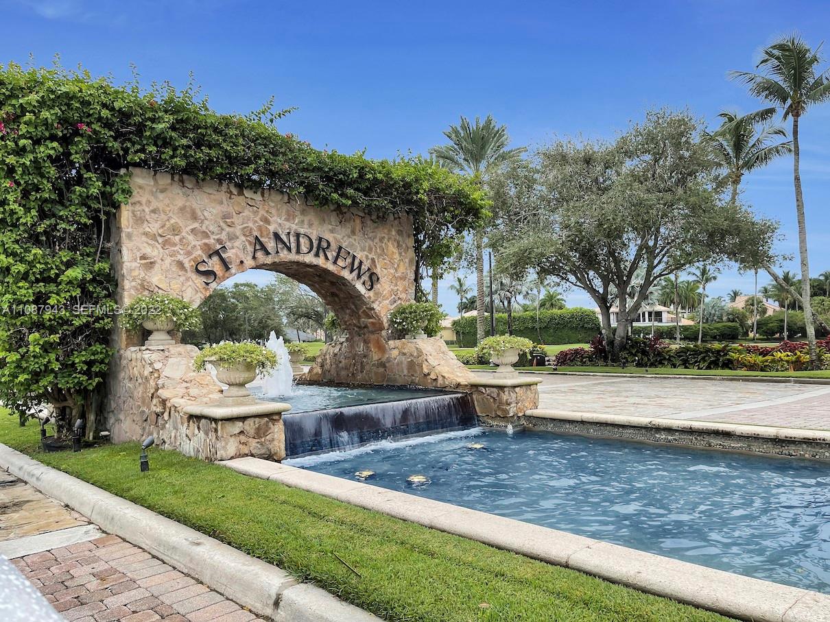 17828 Scarsdale Way Boca Raton, FL 33496 - Photo 98 of 100 a front view of a house with garden