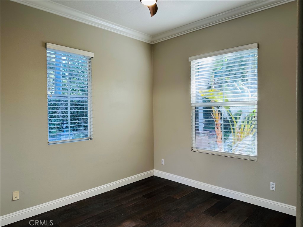 6 Carpenteria Irvine, CA 92602 - Photo 4 of 15 a view of an empty room with wooden floor and a window