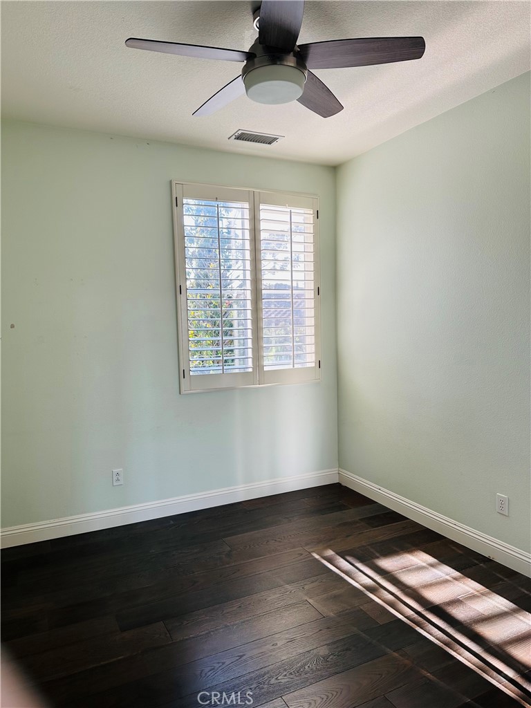 6 Carpenteria Irvine, CA 92602 - Photo 8 of 15 a view of room with window and wooden floor