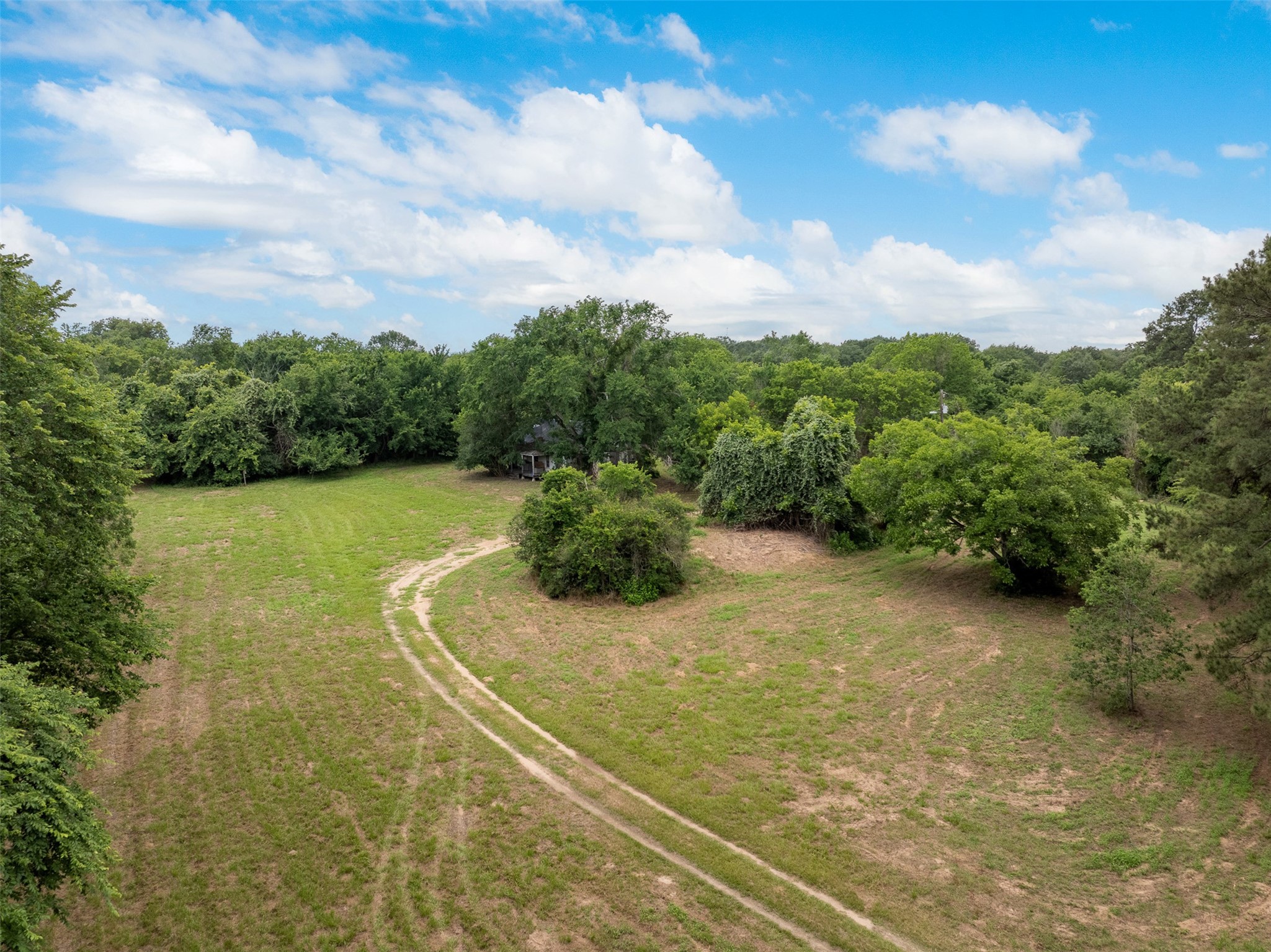 0 Ives Creek Road Bellville, TX 77418 - Photo 29 of 33 a view of a yard with an outdoor space