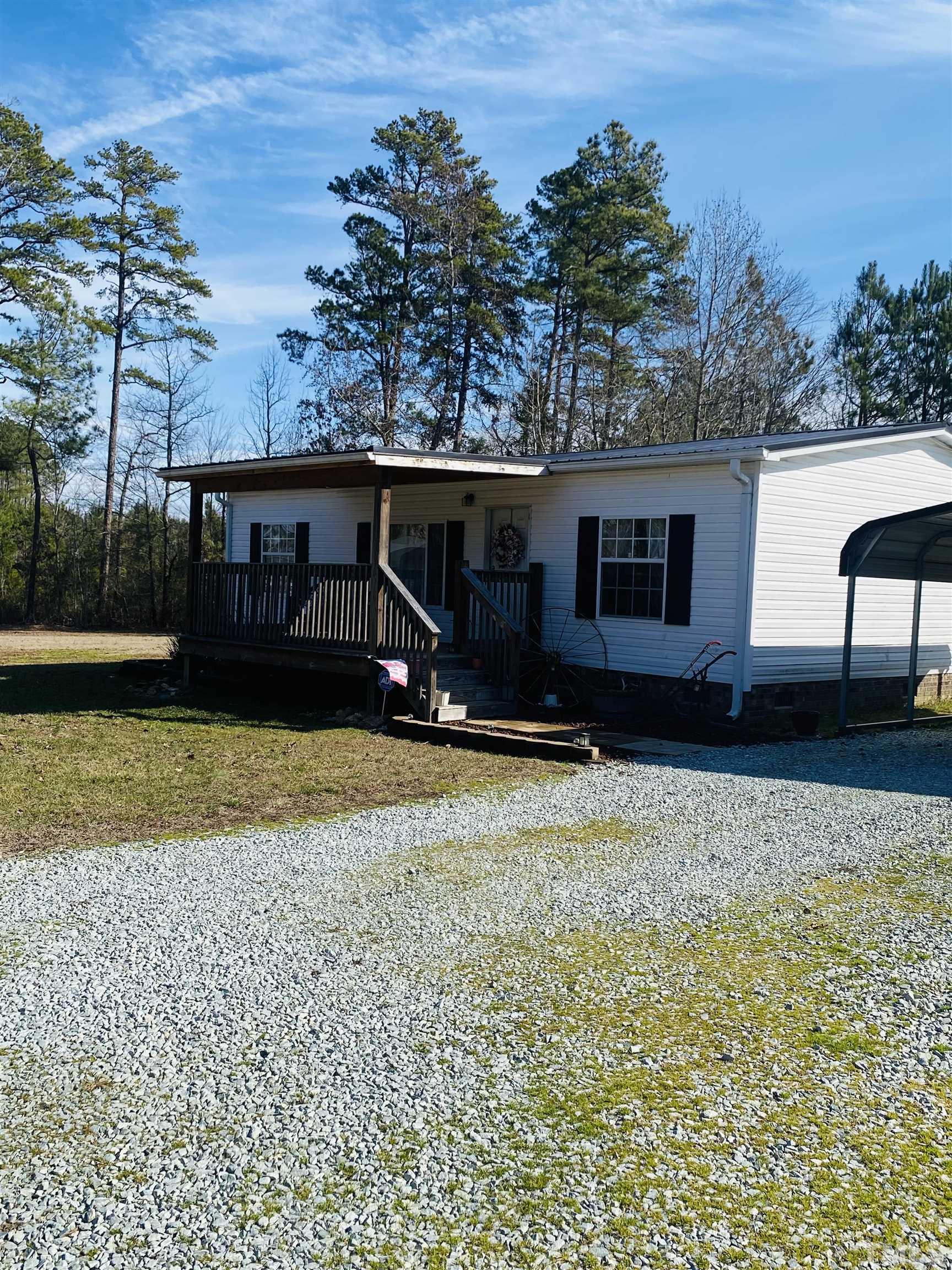 63 Rougemont Road Rougemont, NC 27572 - Photo 3 of 36 a house view with a garden space