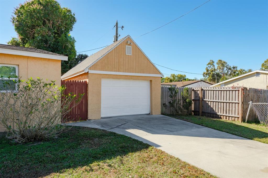 13698 120th Street North Largo, FL 33778 - Photo 26 of 30 a view of a house with a yard