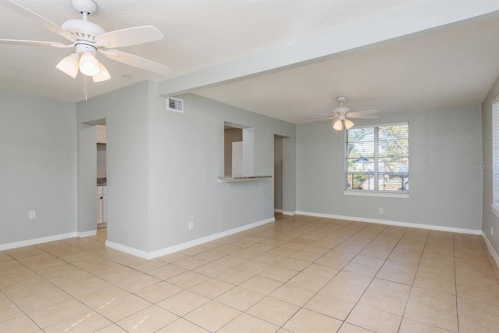 13698 120th Street North Largo, FL 33778 - Photo 5 of 30 a view of an empty room with a window