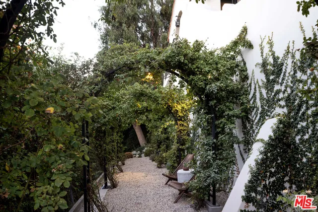 a house view with a garden space