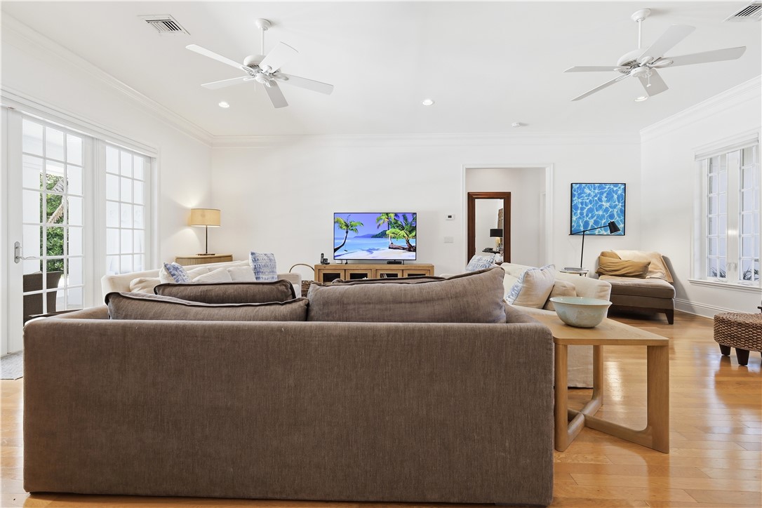 2116 Cavalla Road Vero Beach, FL 32963 - Photo 3 of 23 a living room with furniture and a flat screen tv