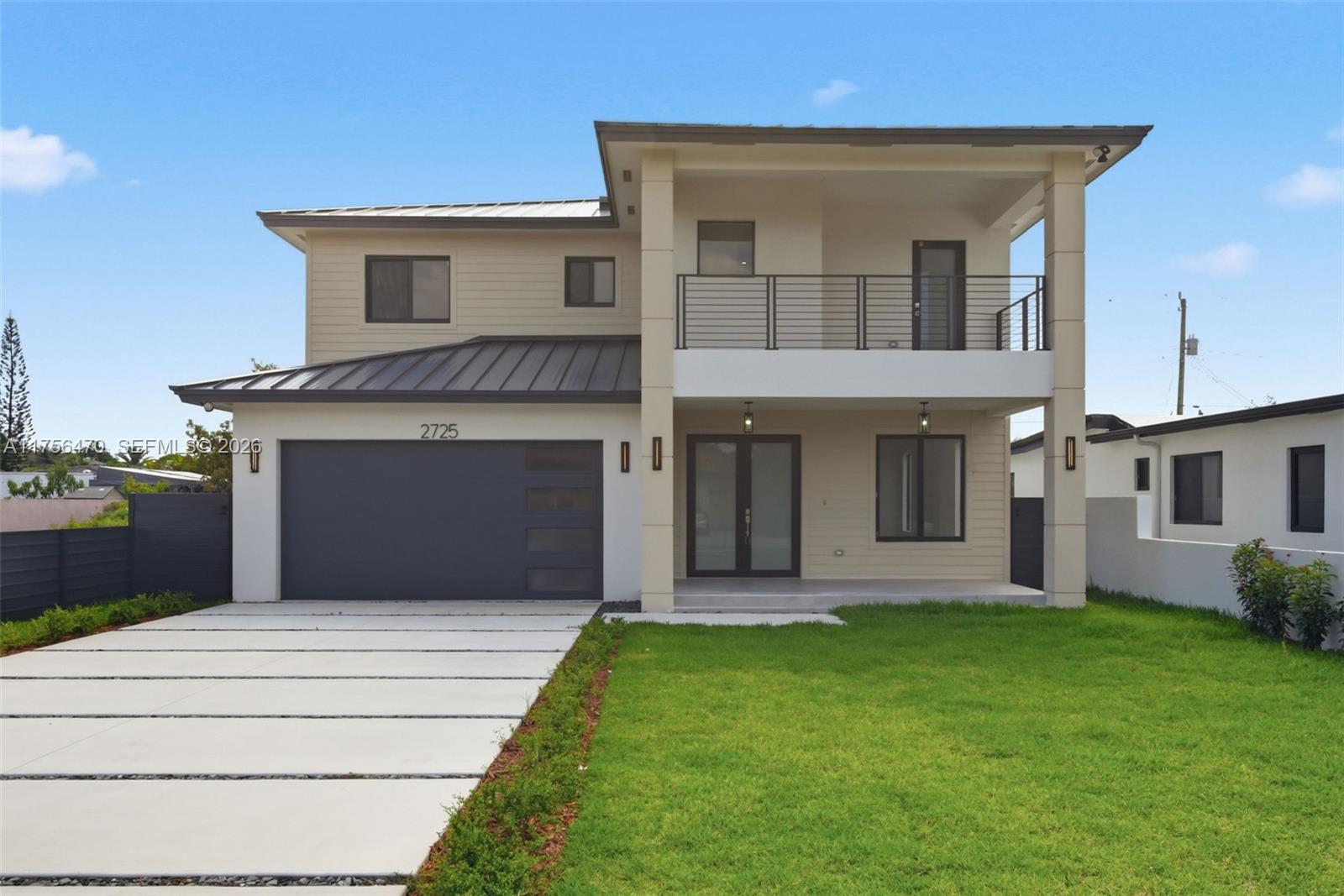 2725 Southwest 65th Avenue Miami, FL 33155 - Photo 1 of 36 a front view of a house with garden